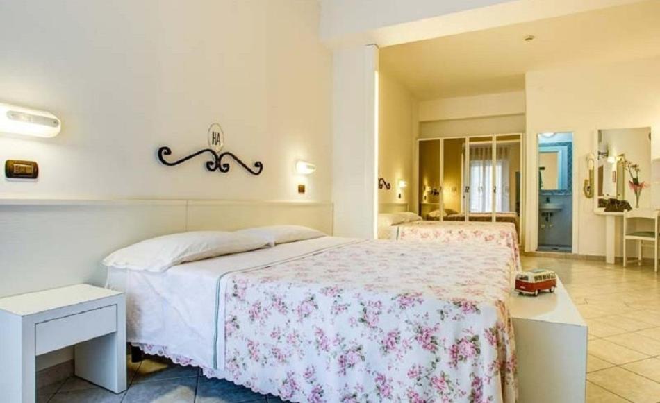 Postel nebo postele na pokoji v ubytování Ancora Hotel & Residence