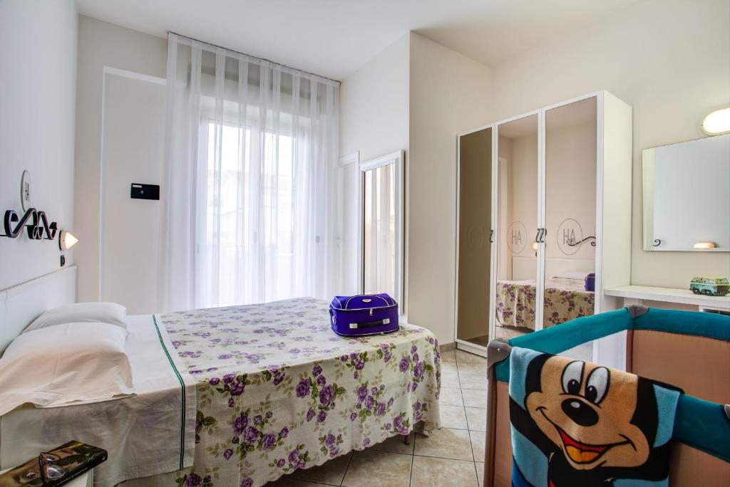 Postel nebo postele na pokoji v ubytování Ancora Hotel & Residence