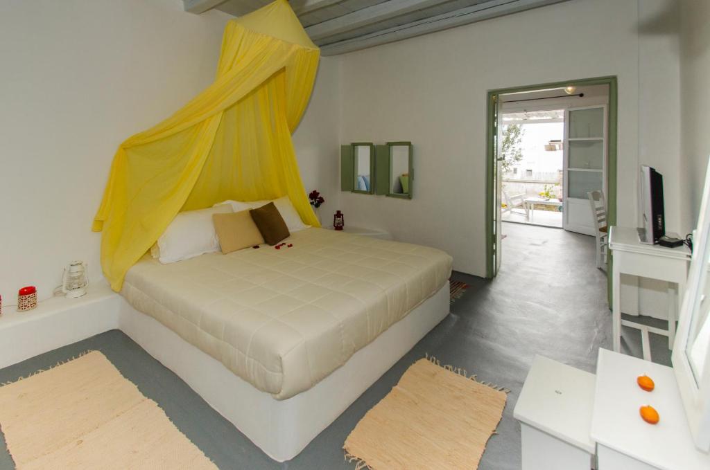 Postel nebo postele na pokoji v ubytování Thalassitra Private Pool Suites