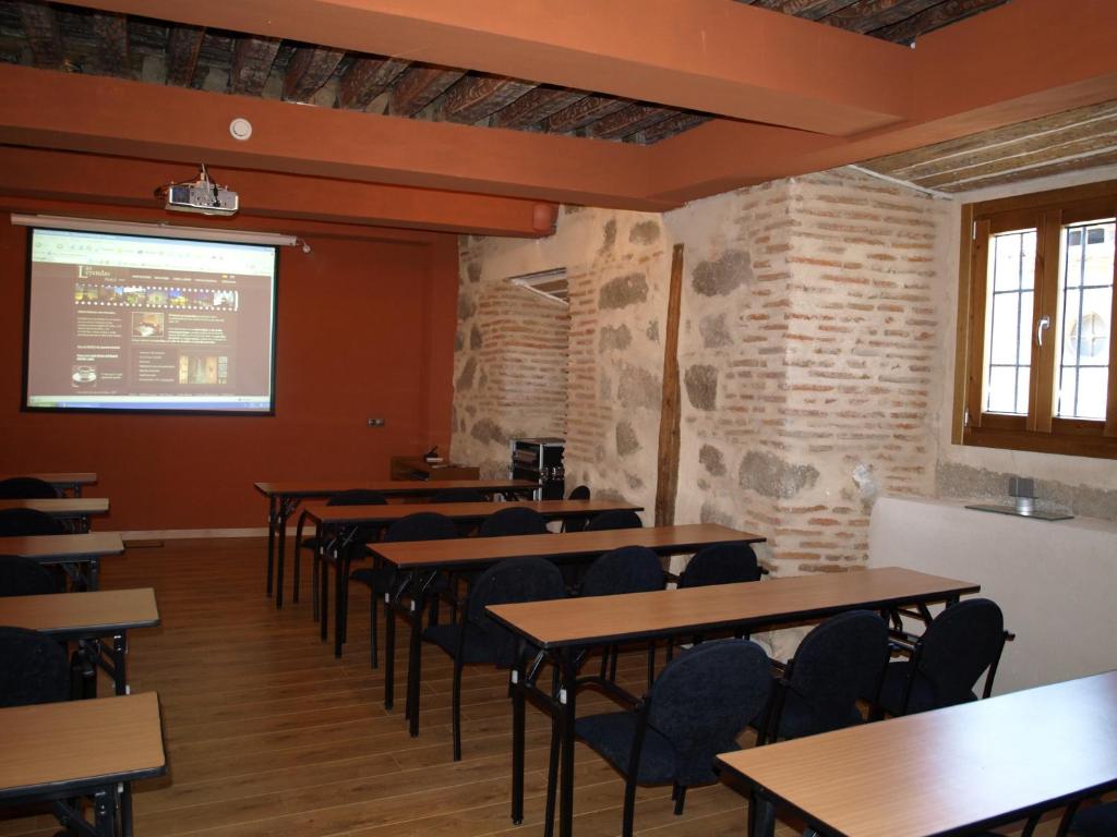 TV a/nebo společenská místnost v ubytování Hotel Las Leyendas