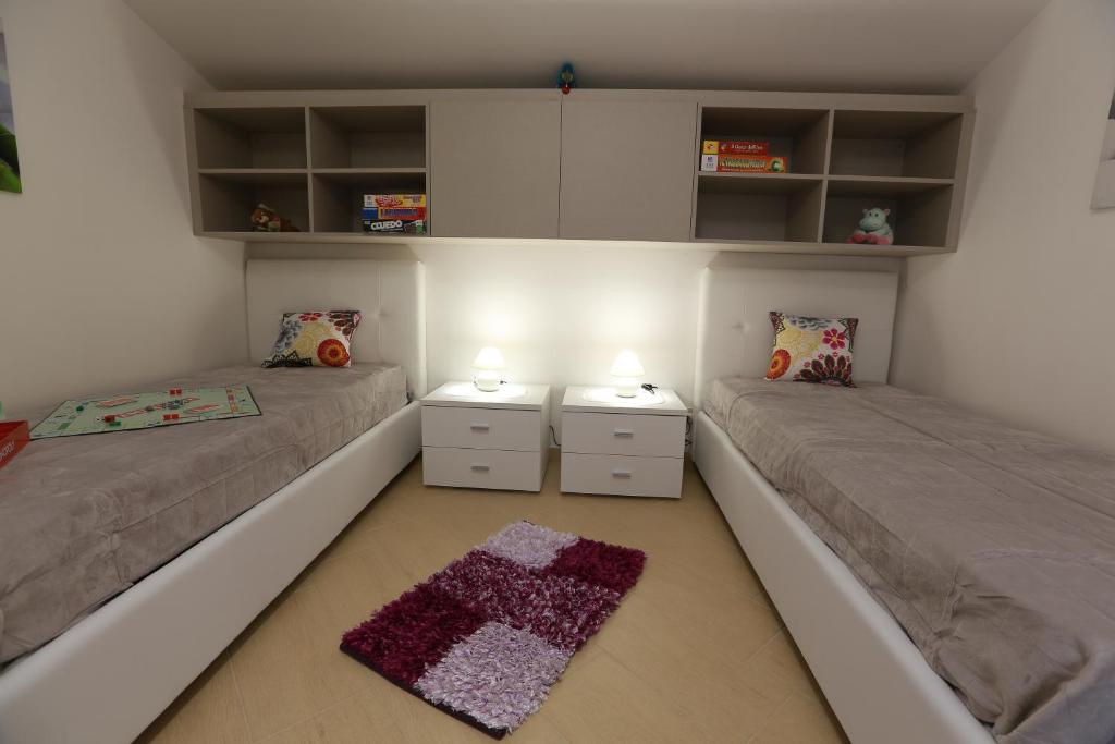 Posteľ alebo postele v izbe v ubytovaní Casa Vacanza Il Dromone