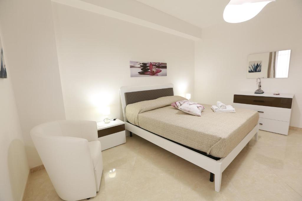 Posteľ alebo postele v izbe v ubytovaní Casa Vacanza Il Dromone