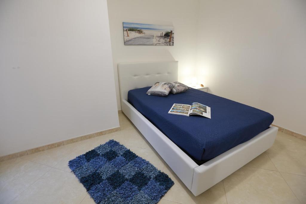 Posteľ alebo postele v izbe v ubytovaní Casa Vacanza Il Dromone