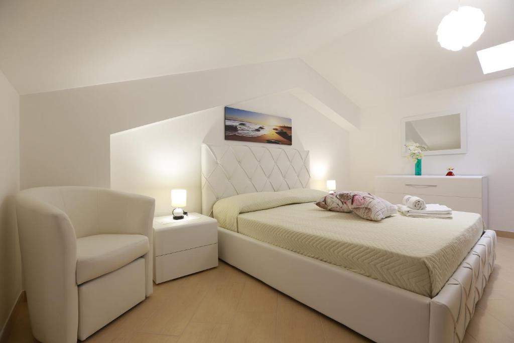 Posteľ alebo postele v izbe v ubytovaní Casa Vacanza Il Dromone