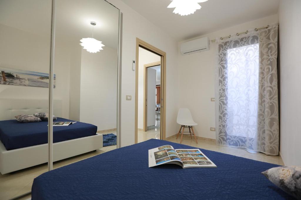 Posteľ alebo postele v izbe v ubytovaní Casa Vacanza Il Dromone