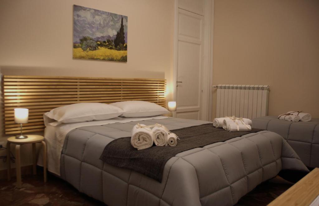 Llit o llits en una habitació de Mantegna Rooms