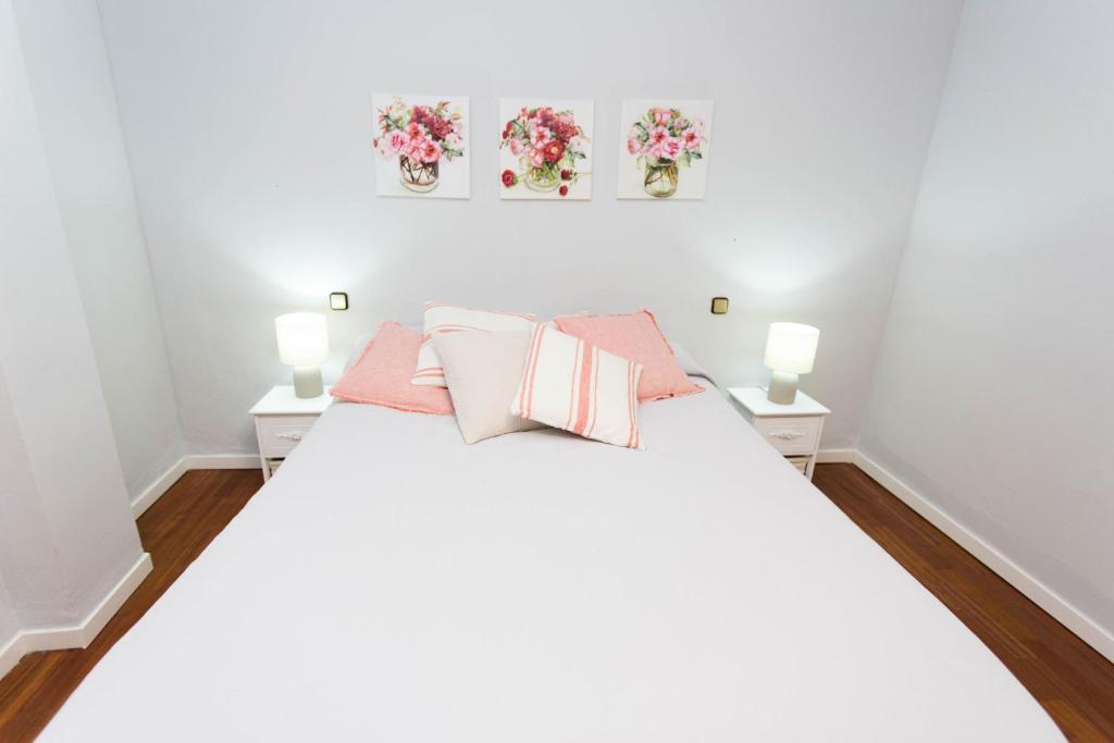 Posteľ alebo postele v izbe v ubytovaní SVQ Apartments - Patio Santa Cruz