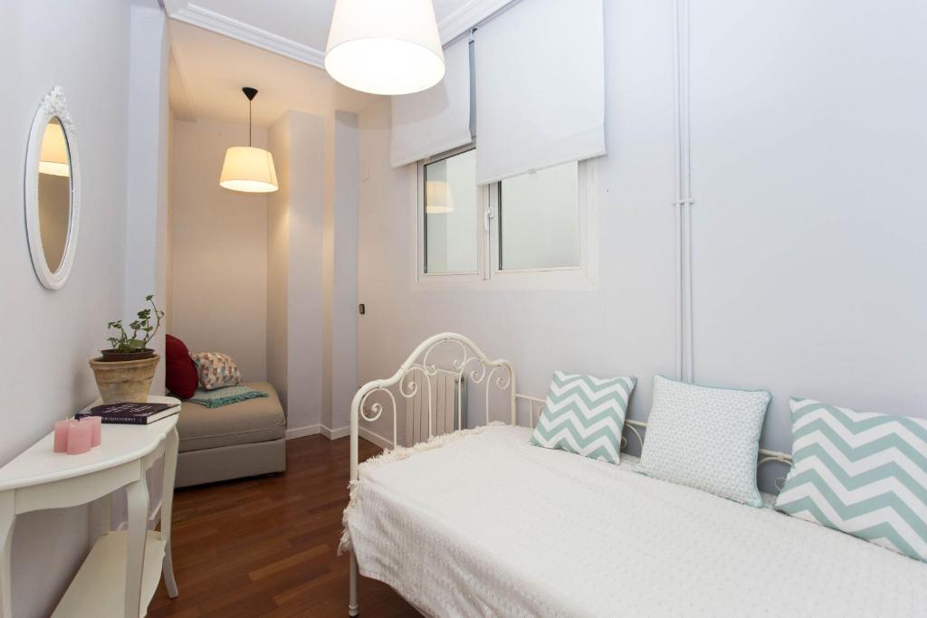 Posteľ alebo postele v izbe v ubytovaní SVQ Apartments - Patio Santa Cruz