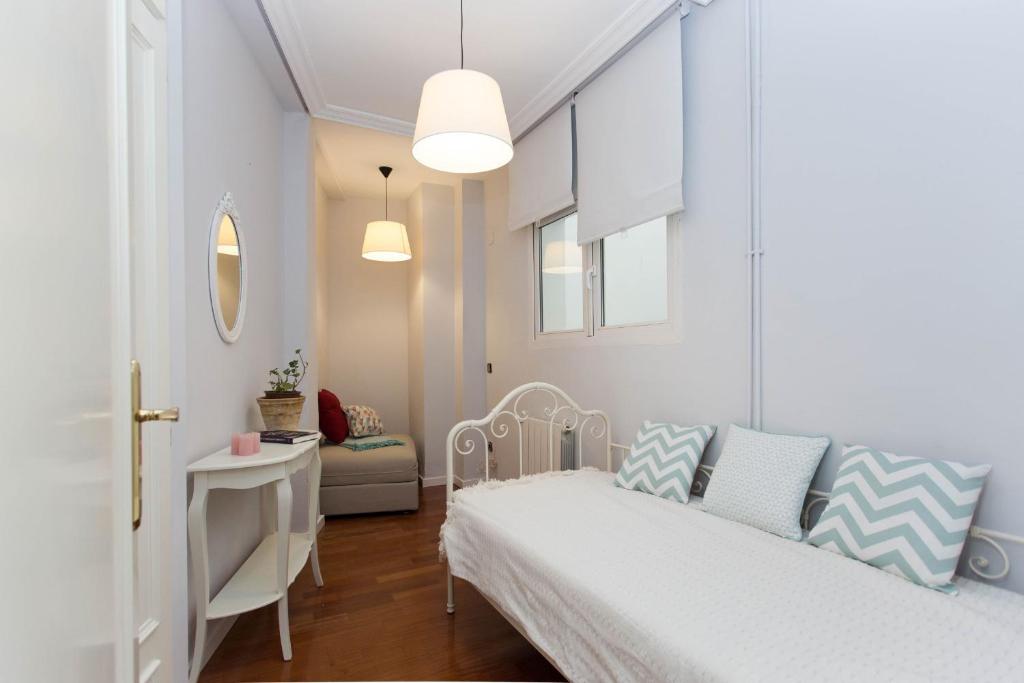 Posteľ alebo postele v izbe v ubytovaní SVQ Apartments - Patio Santa Cruz