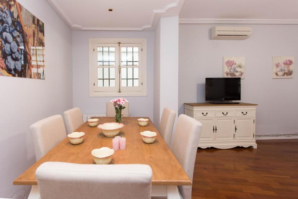 Televízia a/alebo spoločenská miestnosť v ubytovaní SVQ Apartments - Patio Santa Cruz