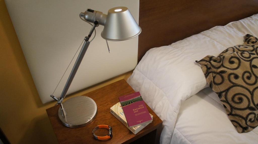 Postel nebo postele na pokoji v ubytování Palm Beach Plaza Hotel