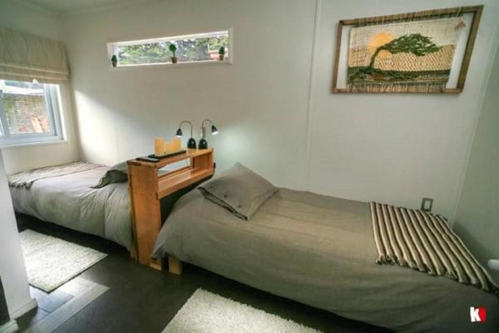 Postel nebo postele na pokoji v ubytování Innata Casa Hostal