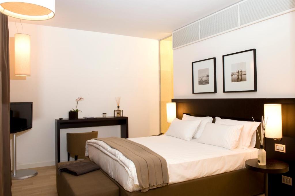 Postel nebo postele na pokoji v ubytování Marina Place Resort
