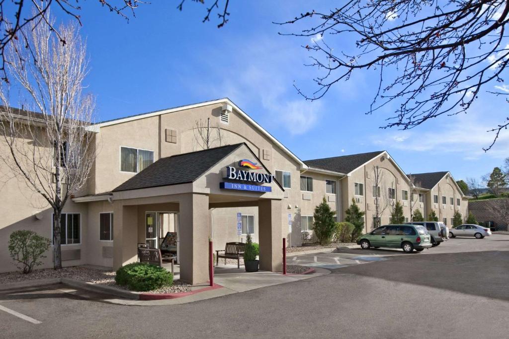 a building with a walmart sign in a parking lot at Baymont by Wyndham Golden/Red Rocks in Lakewood