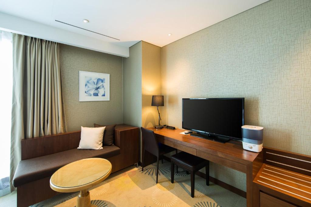 TV a/nebo společenská místnost v ubytování Solaria Nishitetsu Hotel Busan