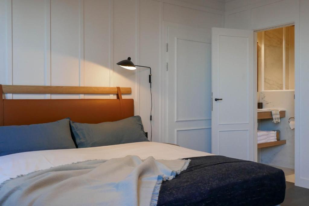 Postel nebo postele na pokoji v ubytování Getaway Studios "The Providence" Oostende