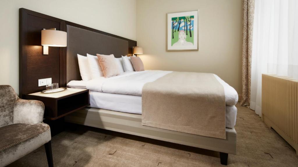 Postel nebo postele na pokoji v ubytování Aria Hotel Prague