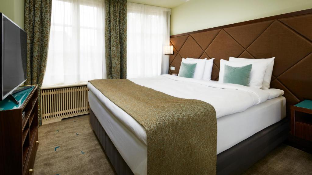 TV a/nebo společenská místnost v ubytování Aria Hotel Prague
