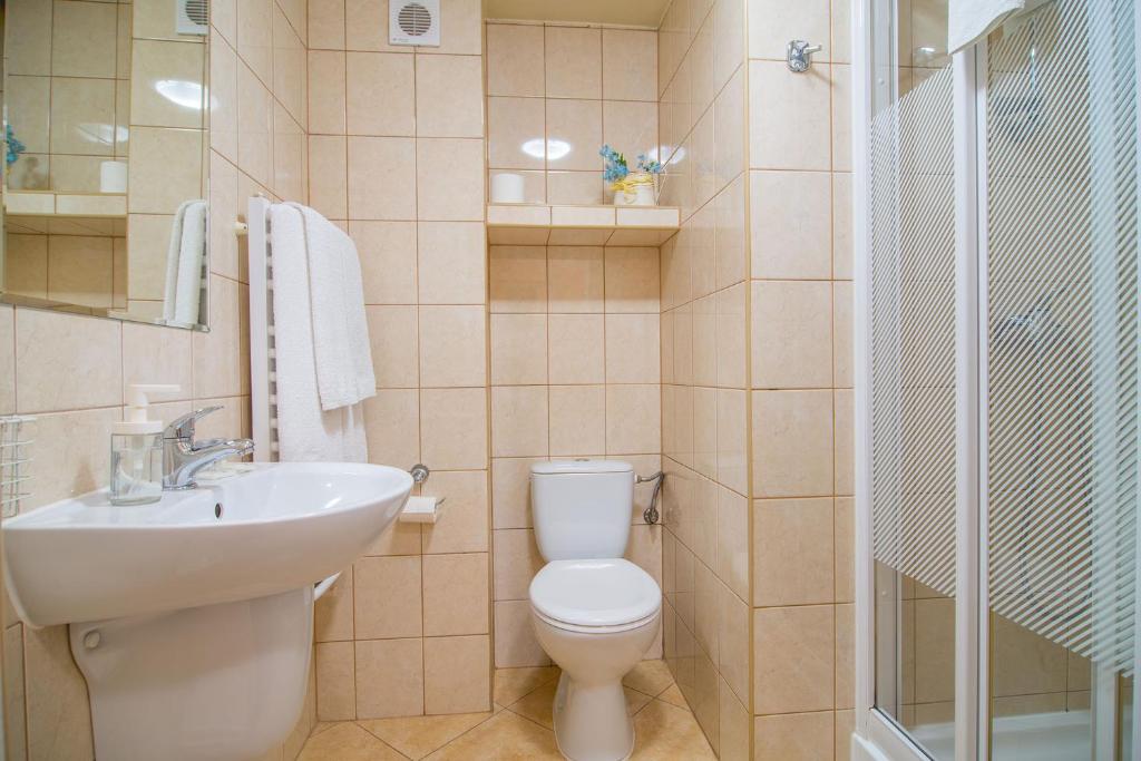 Kúpeľňa v ubytovaní Dom Gościnny Iwona
