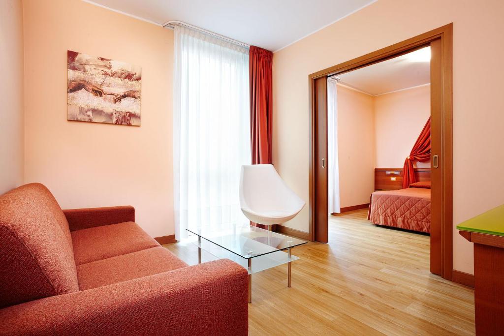 Postel nebo postele na pokoji v ubytování Primhotel