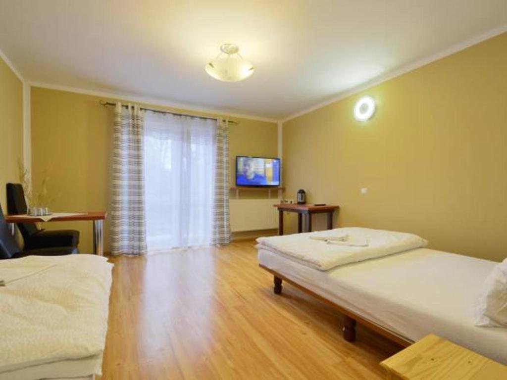 Posteľ alebo postele v izbe v ubytovaní Bizancjum Pokoje Gościnne PARKING FREE 24H