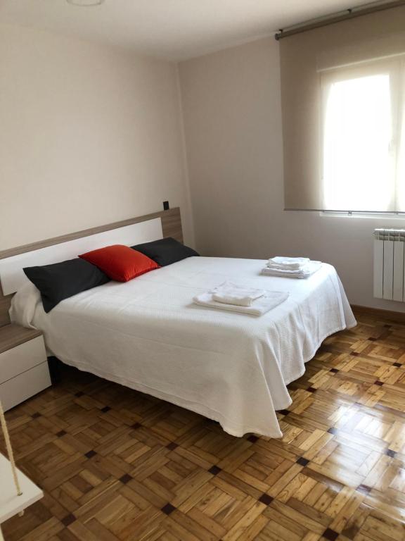 A bed or beds in a room at Madala XXI