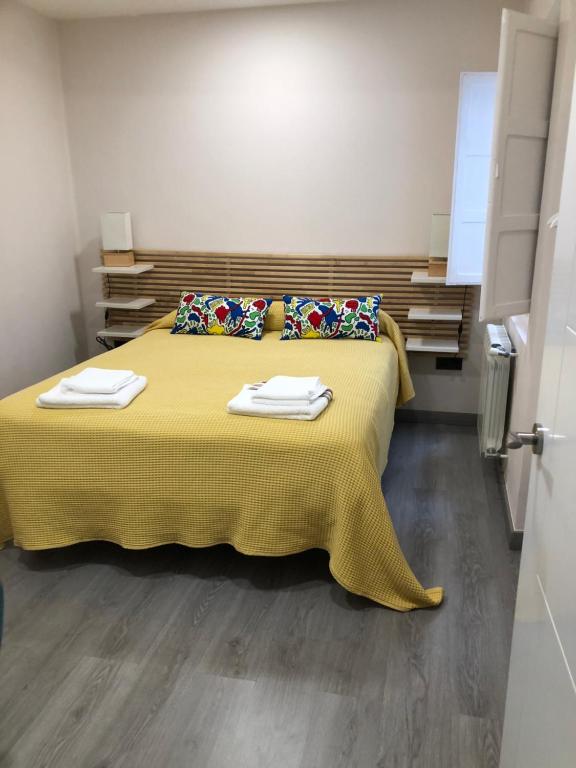 A bed or beds in a room at Madala XXI