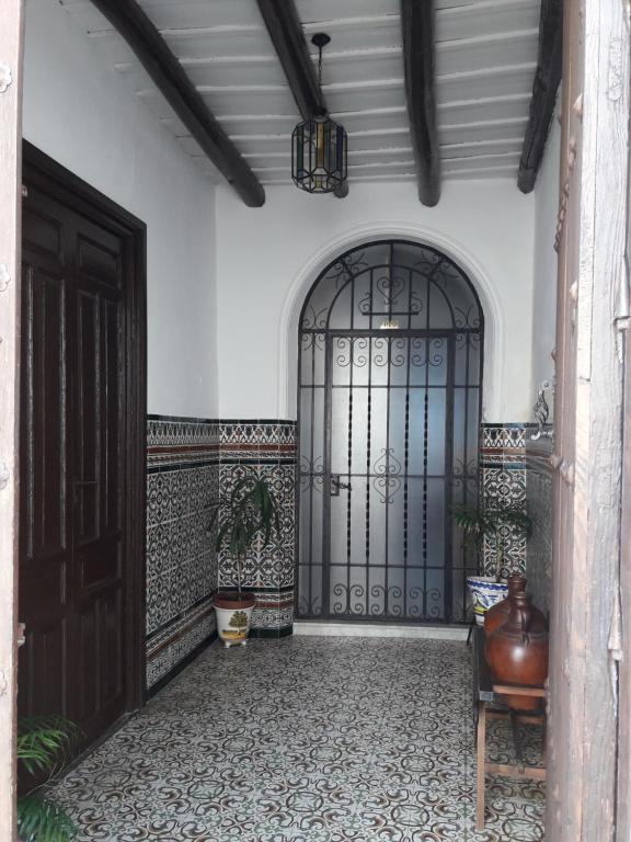 an entrance to a building with two large doors at Casa de La Abuela Pepi in Aracena