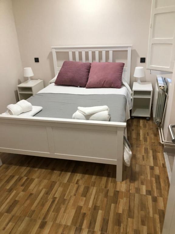 A bed or beds in a room at Madala XXI
