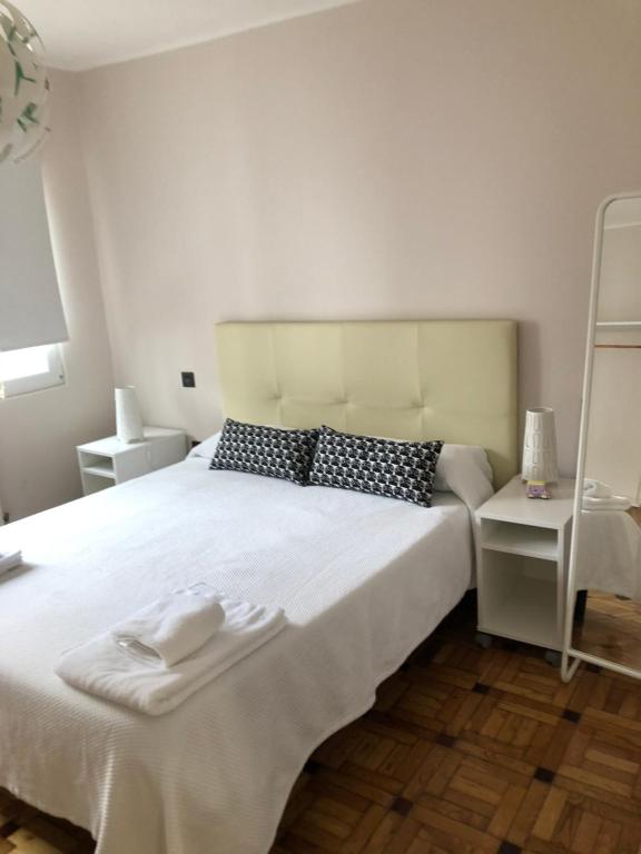 A bed or beds in a room at Madala XXI