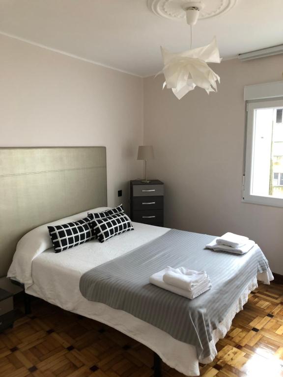 A bed or beds in a room at Madala XXI