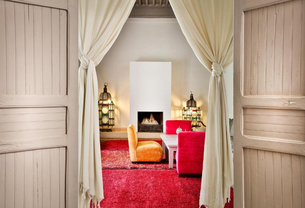 Postel nebo postele na pokoji v ubytování Hotel & Spa Riad Al Jazira
