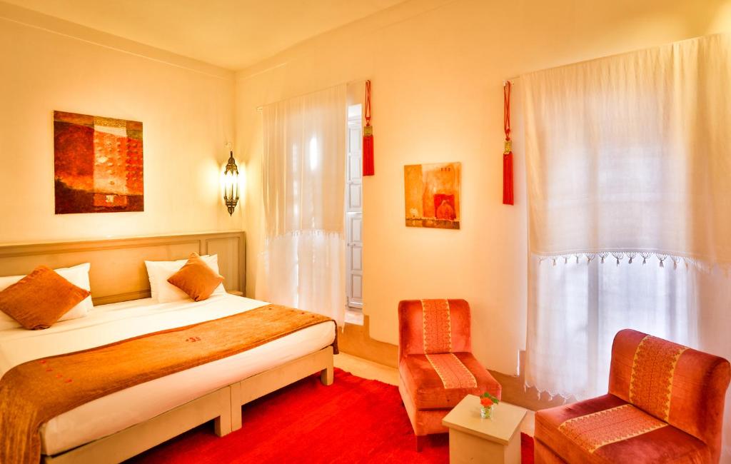 Postel nebo postele na pokoji v ubytování Hotel & Spa Riad Al Jazira