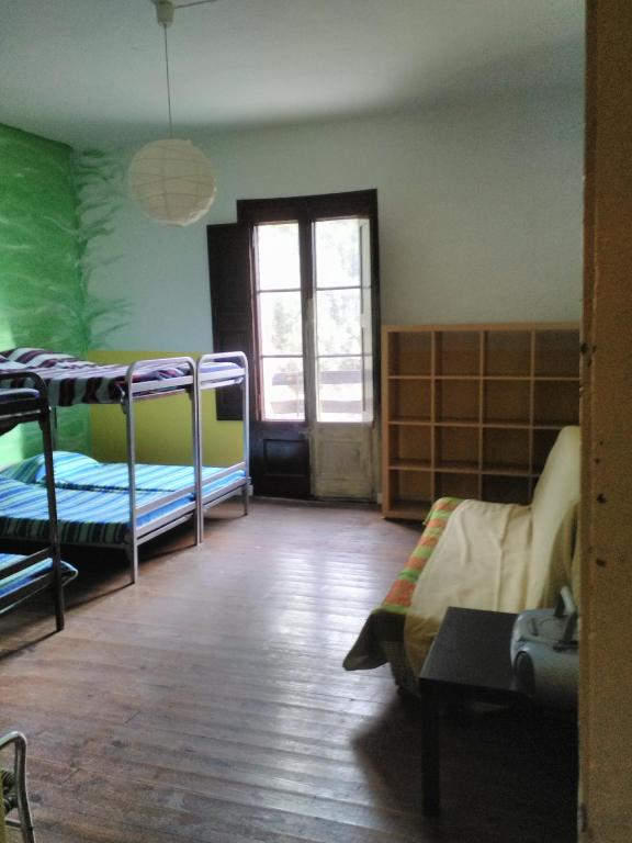 Posteľ alebo postele v izbe v ubytovaní Refugi Quatre Cases