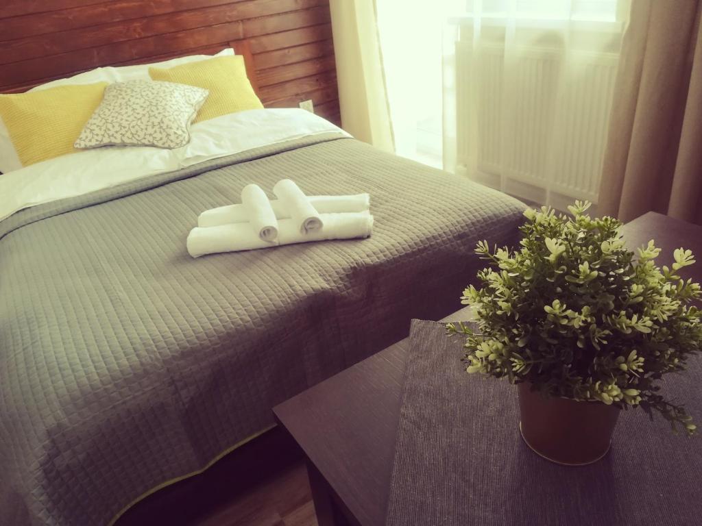 Postel nebo postele na pokoji v ubytování Apartamenty Milka