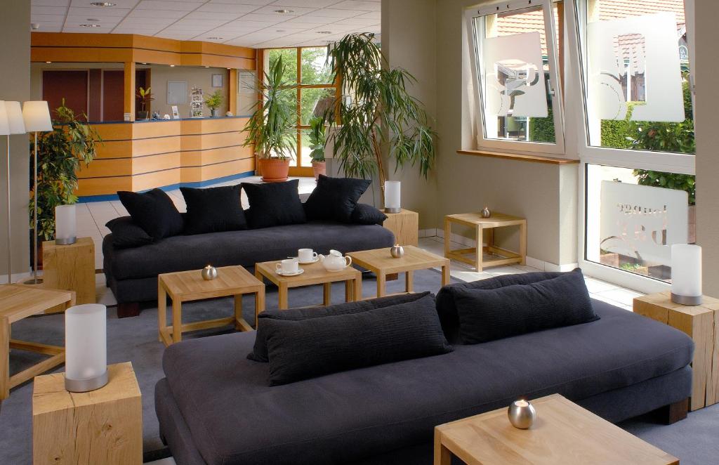 Posezení v ubytování Als Hôtel