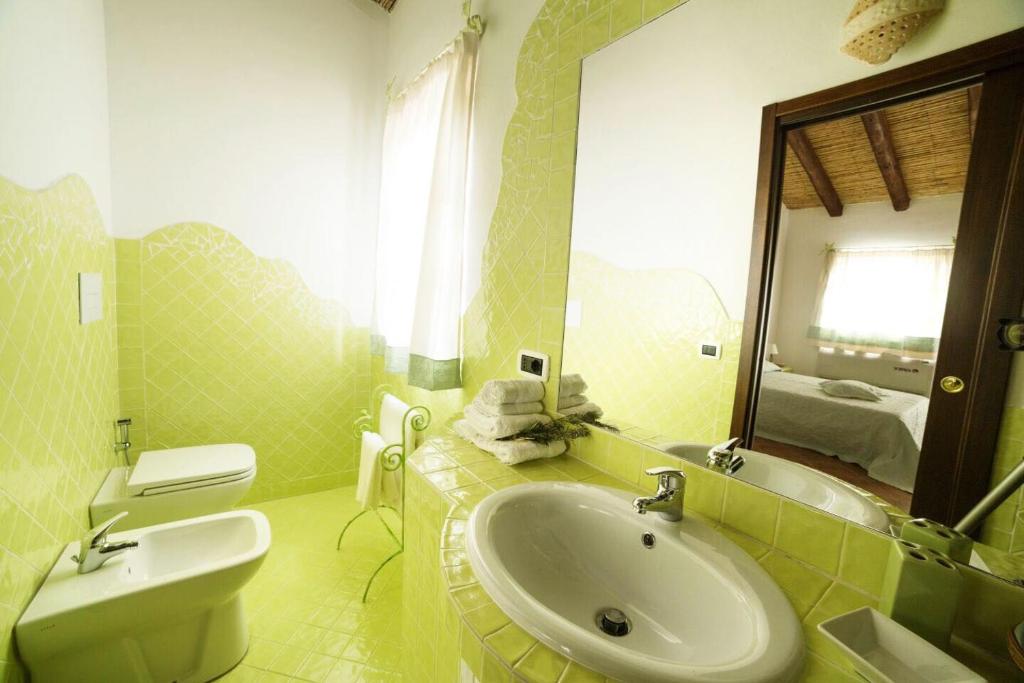 Koupelna v ubytování Villamarina Garden Relais