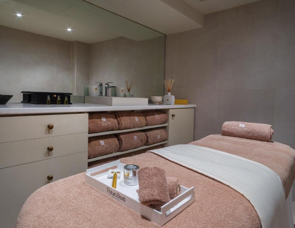 Postel nebo postele na pokoji v ubytování Hotel Can Cera
