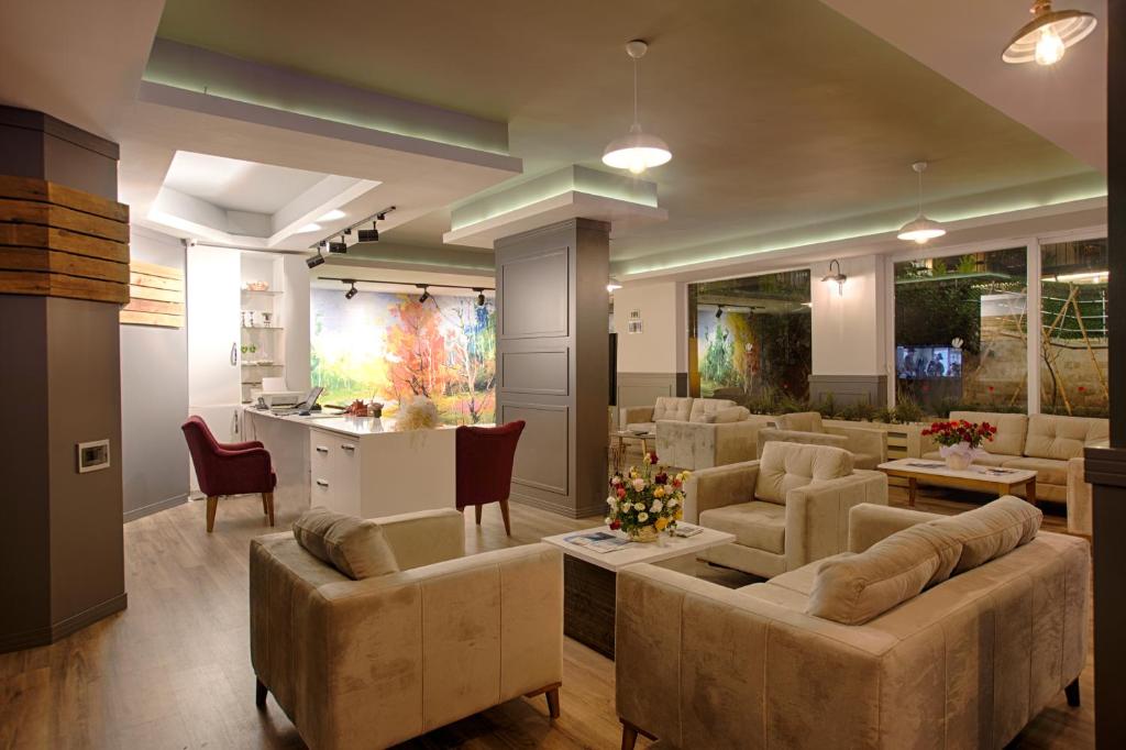 Posezení v ubytování HMA Hotel & Suites