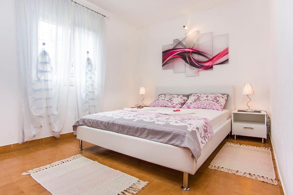 Postel nebo postele na pokoji v ubytování Holiday house "Kale"