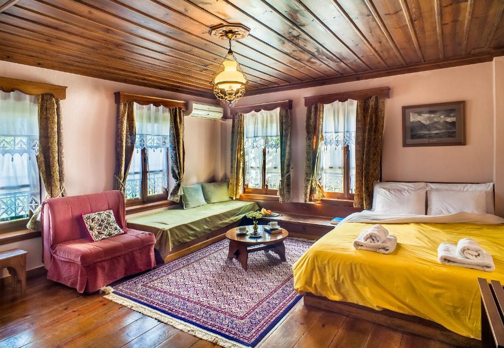 A bed or beds in a room at En Chora Vezitsa