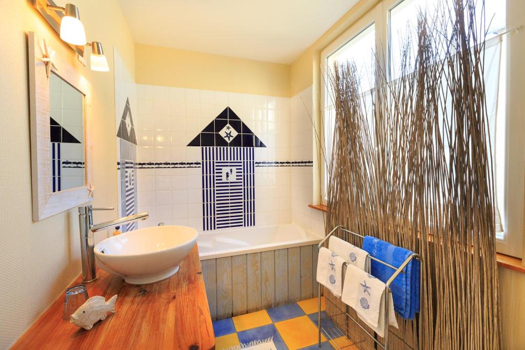 Koupelna v ubytování Les Transats Chambre et appartements Face à la mer