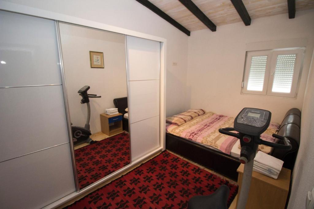 Postel nebo postele na pokoji v ubytování Hotel & Rooms Lombrelle