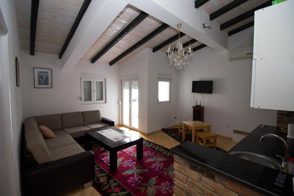 Posezení v ubytování Hotel & Rooms Lombrelle