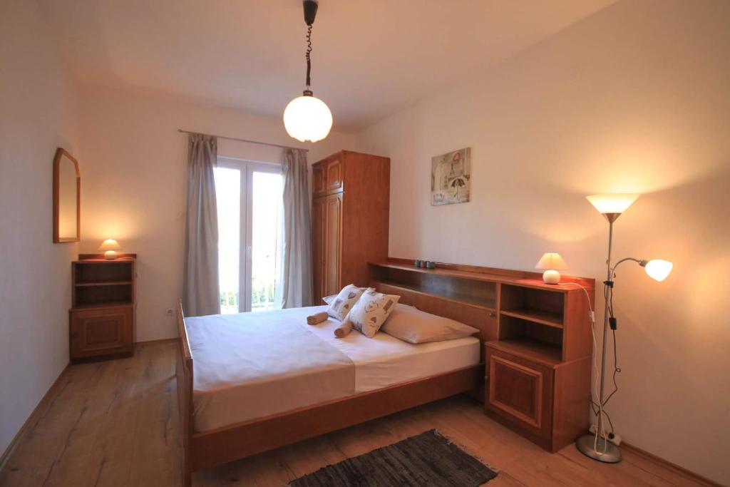 Posteľ alebo postele v izbe v ubytovaní Marivo Guest House