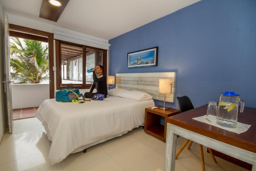 Postel nebo postele na pokoji v ubytování Casita de la Playa