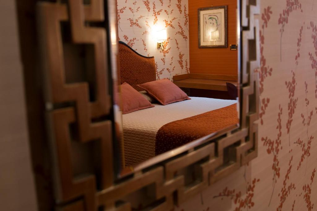 Postel nebo postele na pokoji v ubytování Hotel Europa