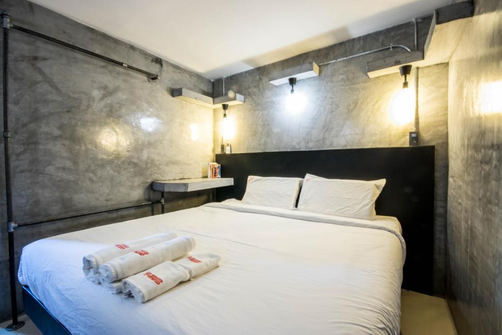 Postel nebo postele na pokoji v ubytování AVA Boutique Guesthouse