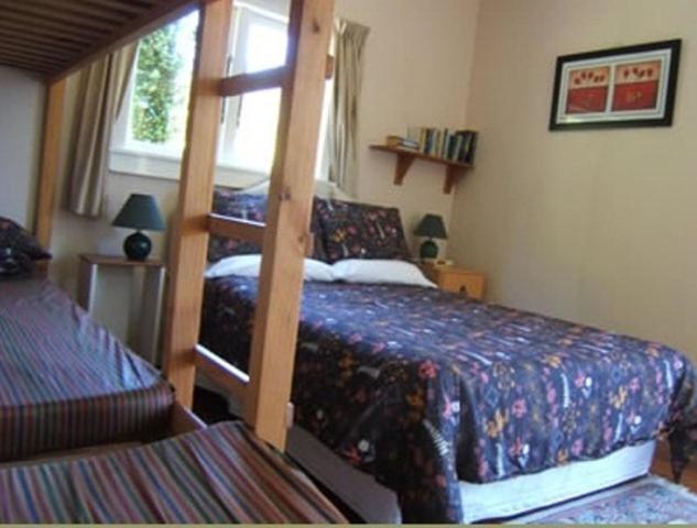 Postel nebo postele na pokoji v ubytování Te Mata Lodge