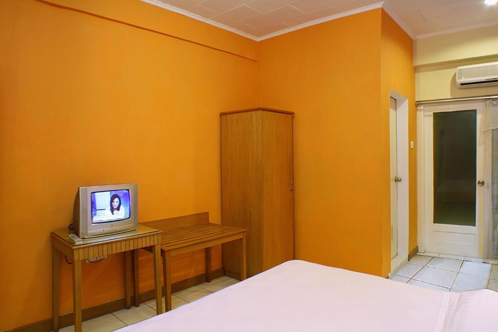 TV a/nebo společenská místnost v ubytování Hotel Hangtuah